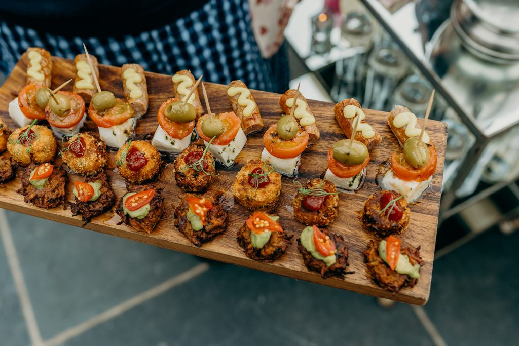 close of up of wedding canapes on a wooden board