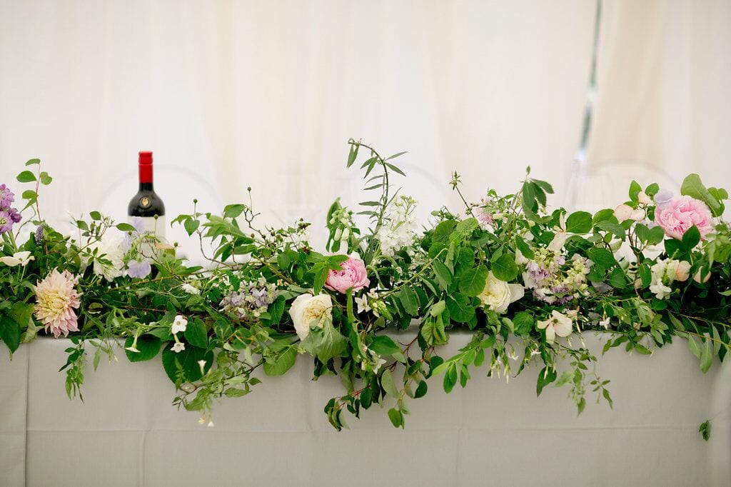 foliage wedding trend top table garland