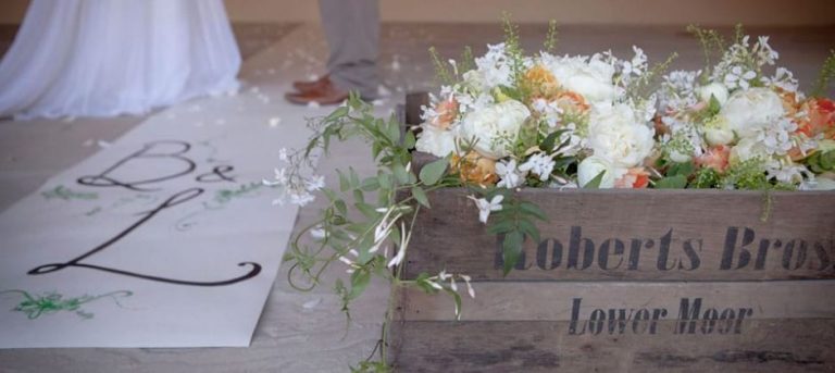 woodland organic theme flower bouquet with personalised wedding runners