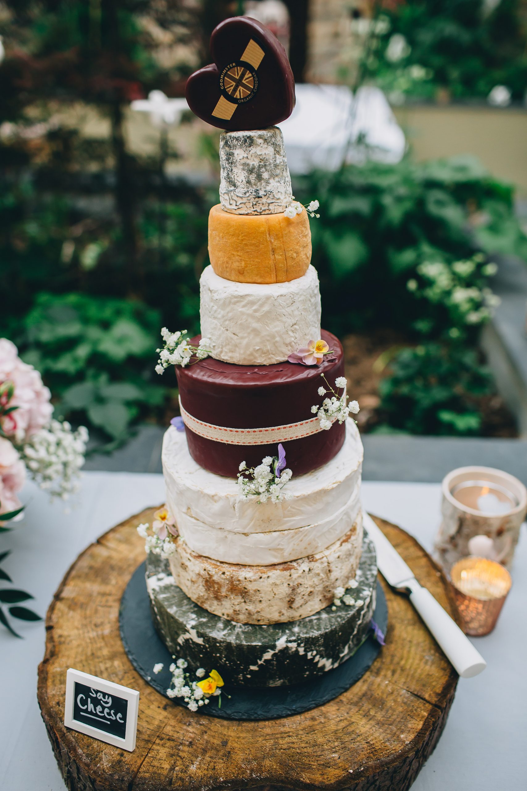 cheese, wheel, stinky, wedding, tower, cake, heart, ever after, cheese gromit, flower, fruit, leaves, ribbon, wax, colours, crackers