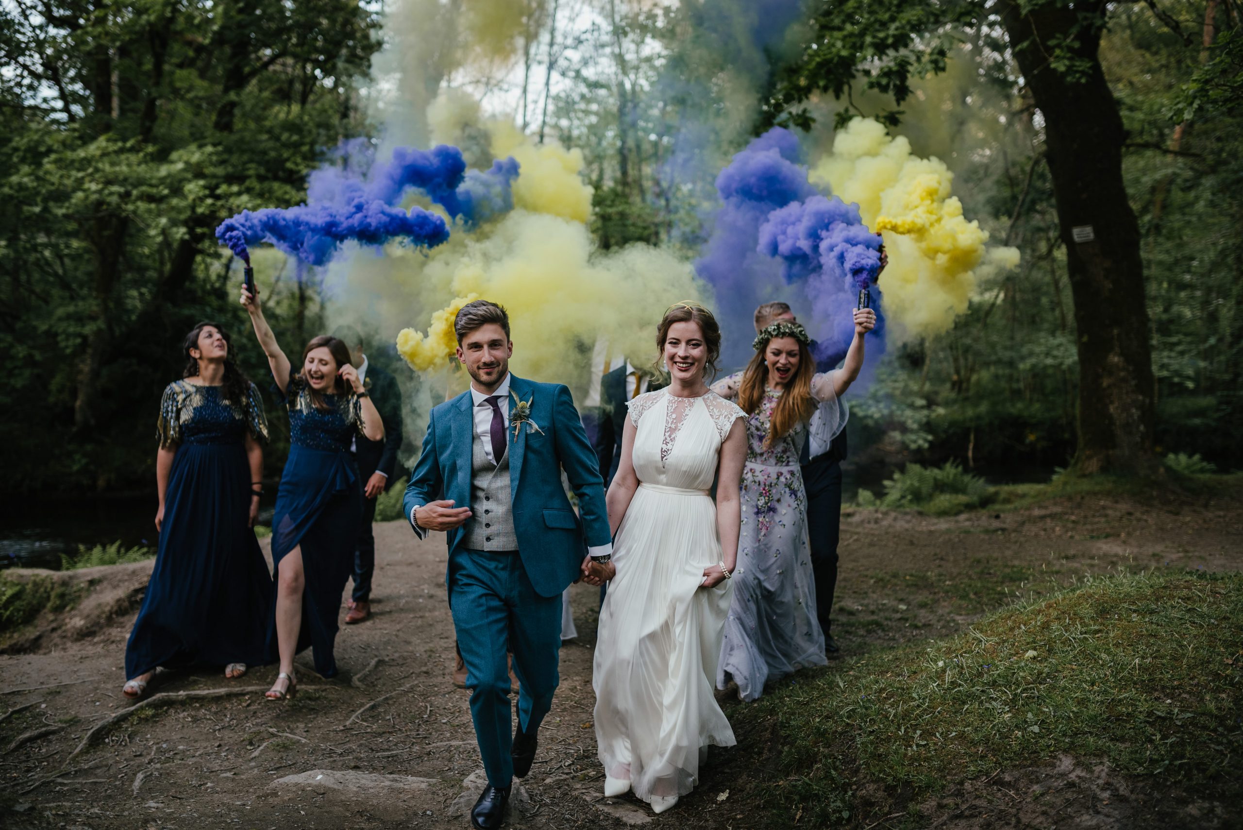 bride and groom smoke bomb celebration