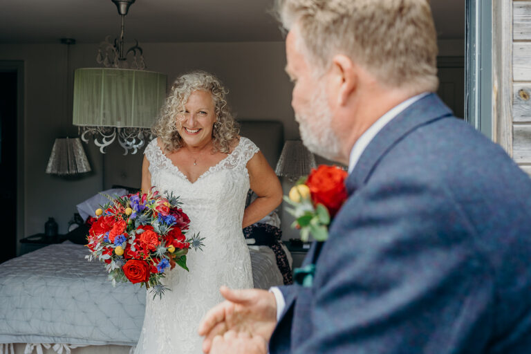 first look for bride and groom before wedding ceremony