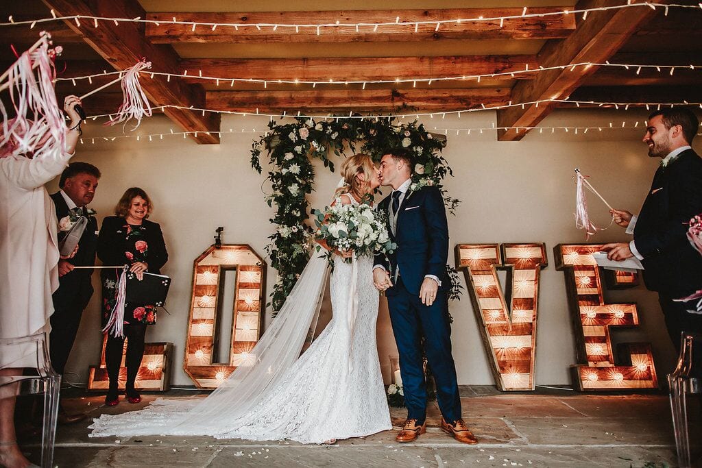 bride and groom barn ceremony devon wedding venue ever after