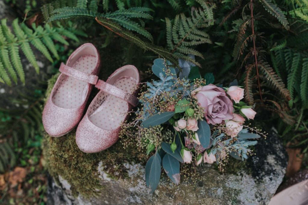 daughter's shoes matching bouquet at winter elopement