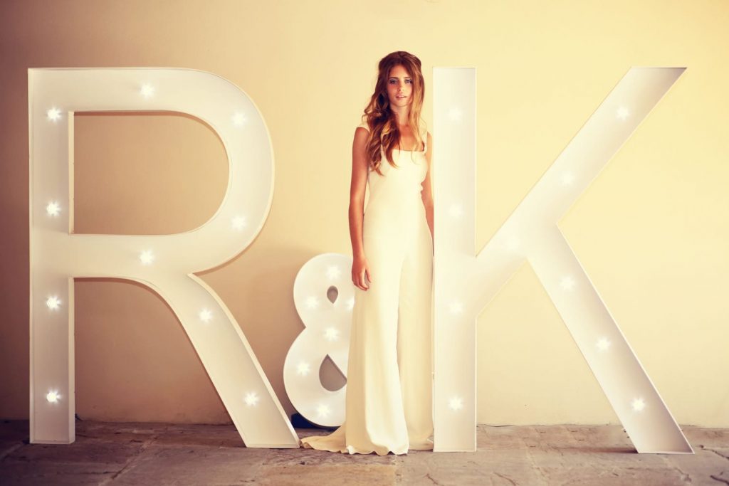 Giant light up letters supplied by www.inspire-hire.co.uk  Bridal trouser suit by Sarah Treble