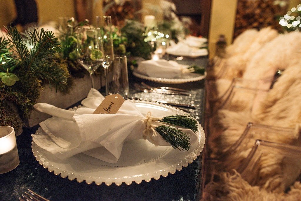 Christmas tablescape white green sequins sheepskins